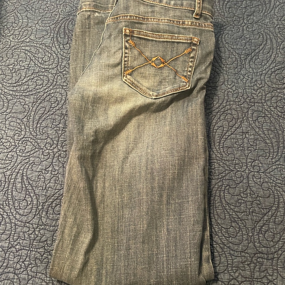 Stylish Blue Jeans with Gold Stitching